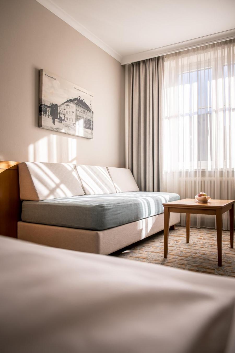 Hotel Post Alpine Cityflair Брунико Экстерьер фото